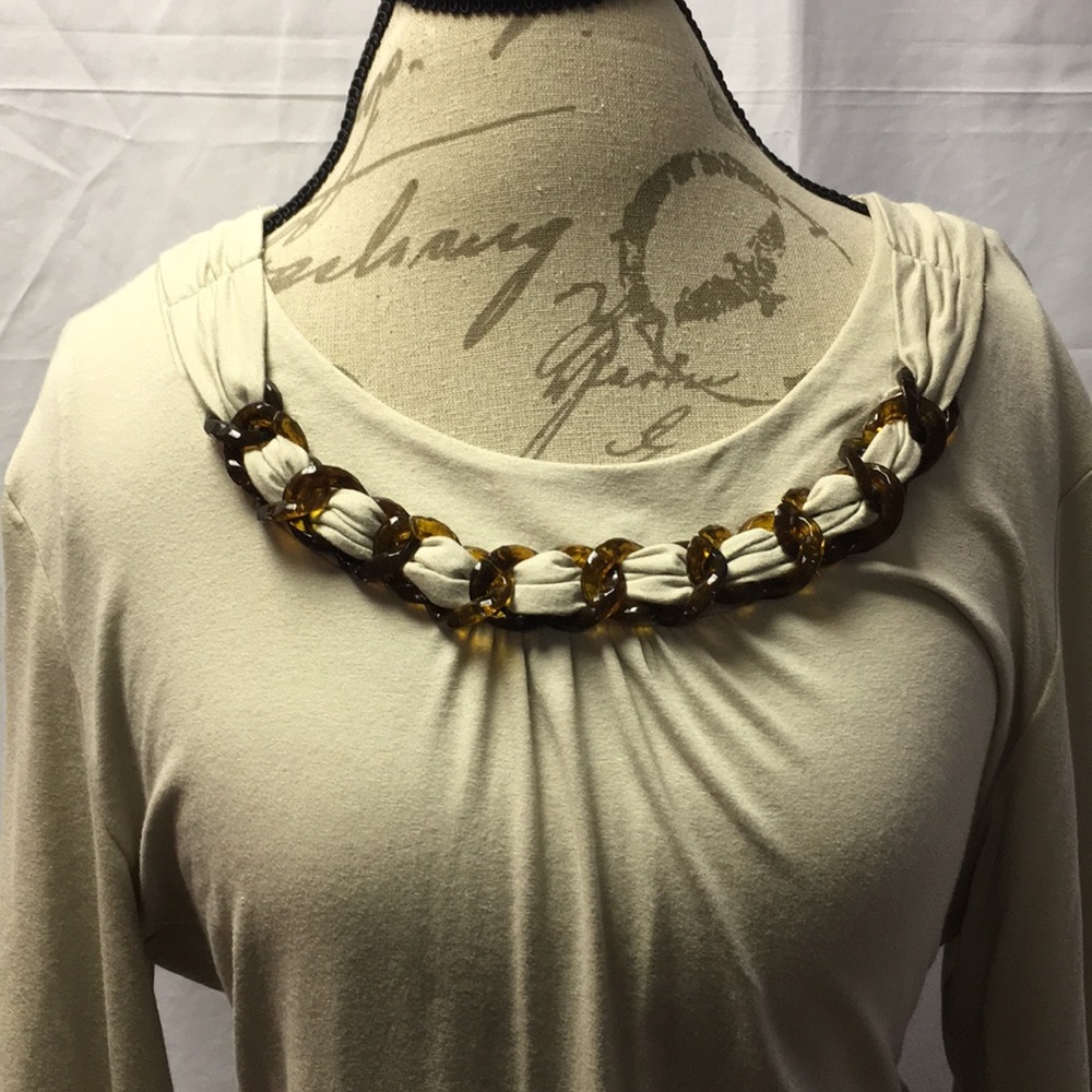Tan long sleeve T-shirt by Chico’s.